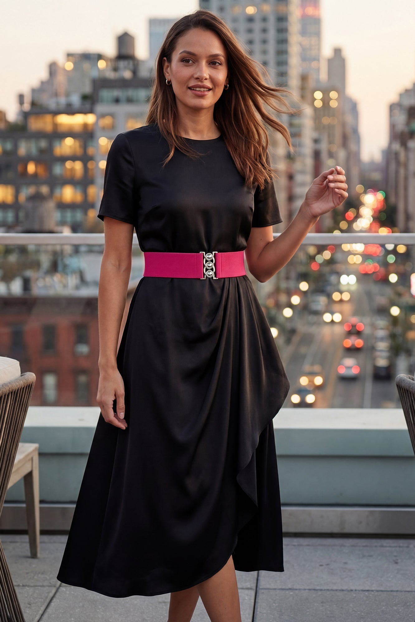 black dress with hot pink belt Confidence is key when it comes to bright colors!
